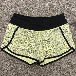 Yellow and black lululemon speed up shorts